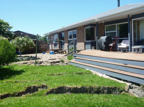 Land damage around a home following the 2016 Kaikōura earthquake