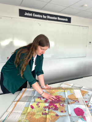 Dr Lauren Vinnell planning locations for the survey on perceptions of seismic hazard in the Auckland region.