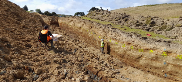 Scientists investigating Settlement Fault, Catlins